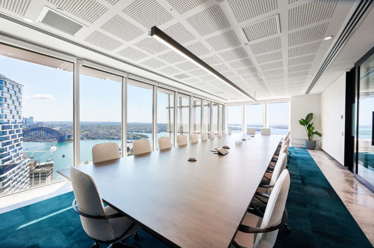 Boardroom table in a meeting room with view of Sydney harbour