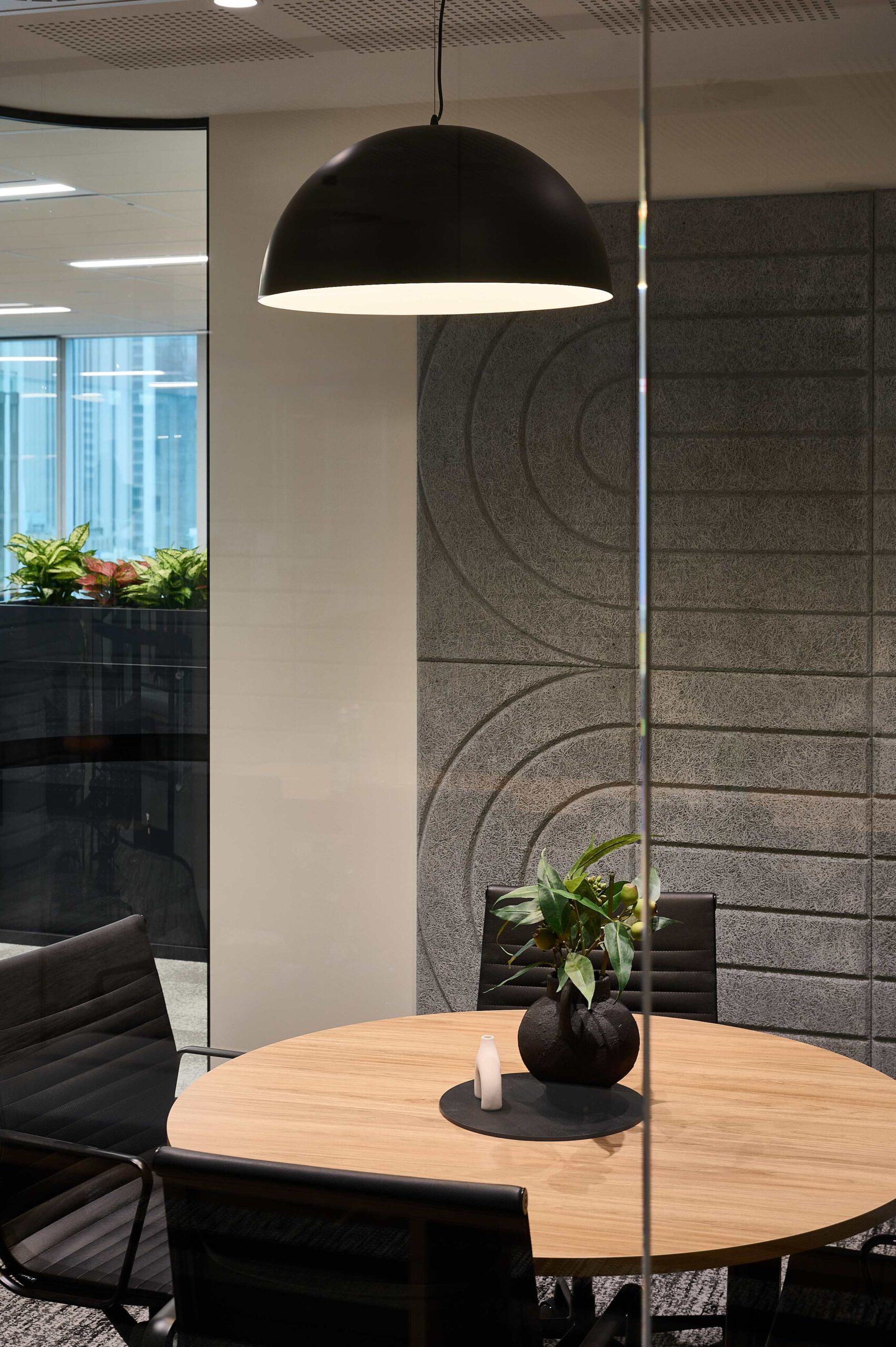 Suite 3 - Arched acoustics panels complement the masculine design