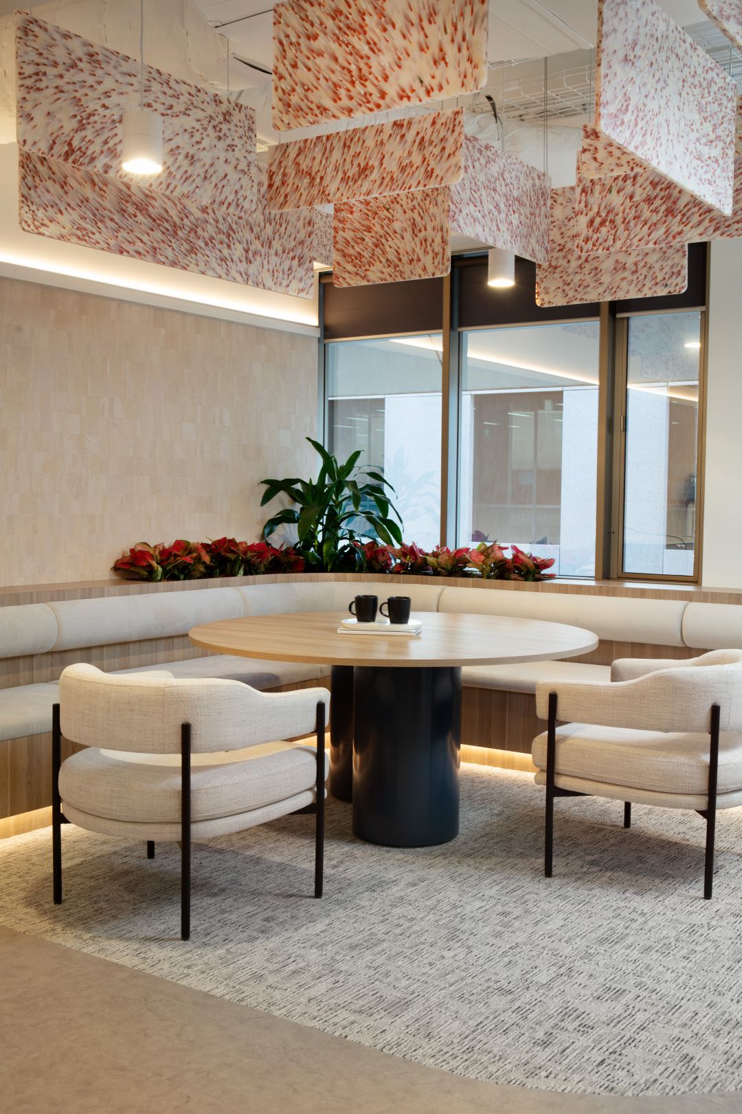portrait breakout area with bespoke ceiling decal
